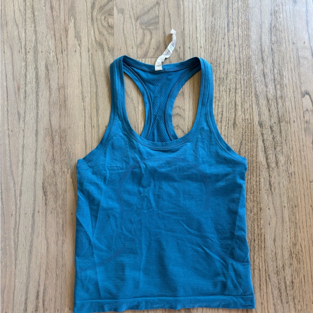 Women's Teal Racerback Tank Top. Race short length